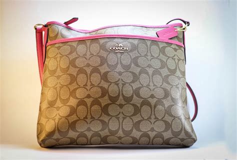 bolsa coach cafe con rosa